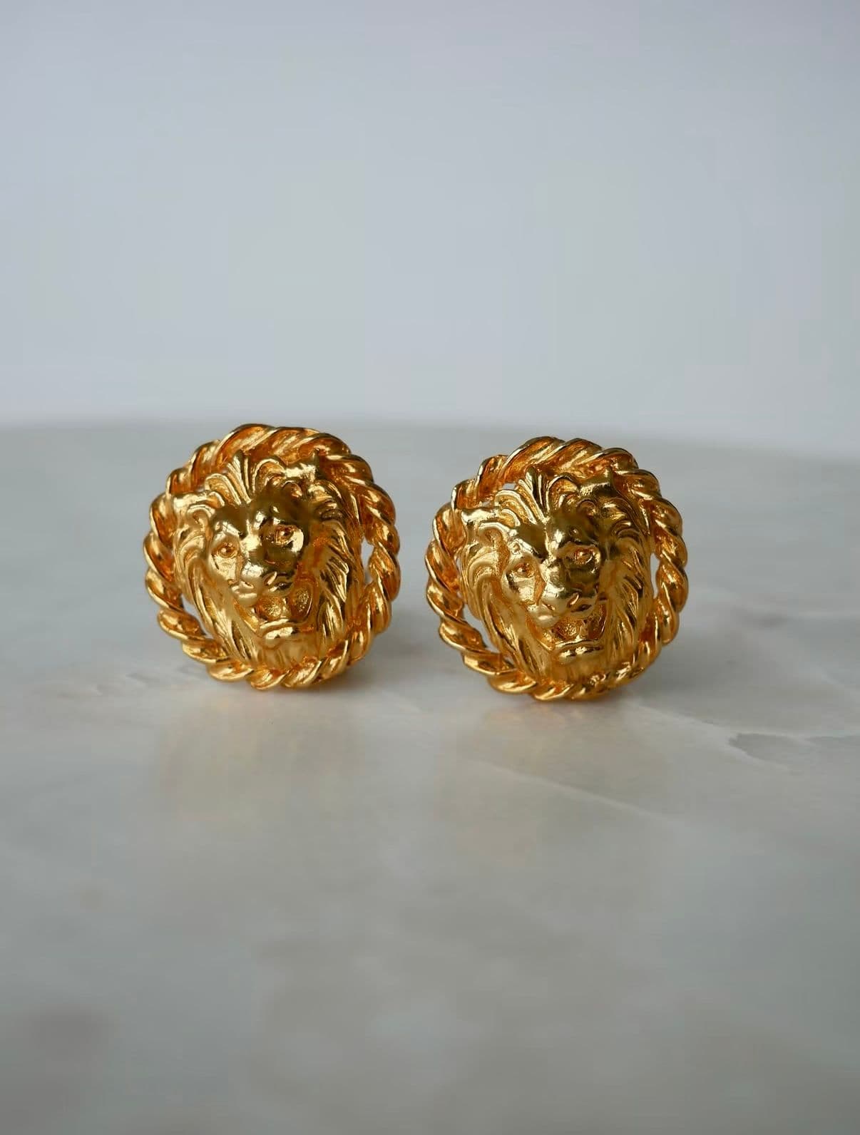 Lion head gold plated earrings